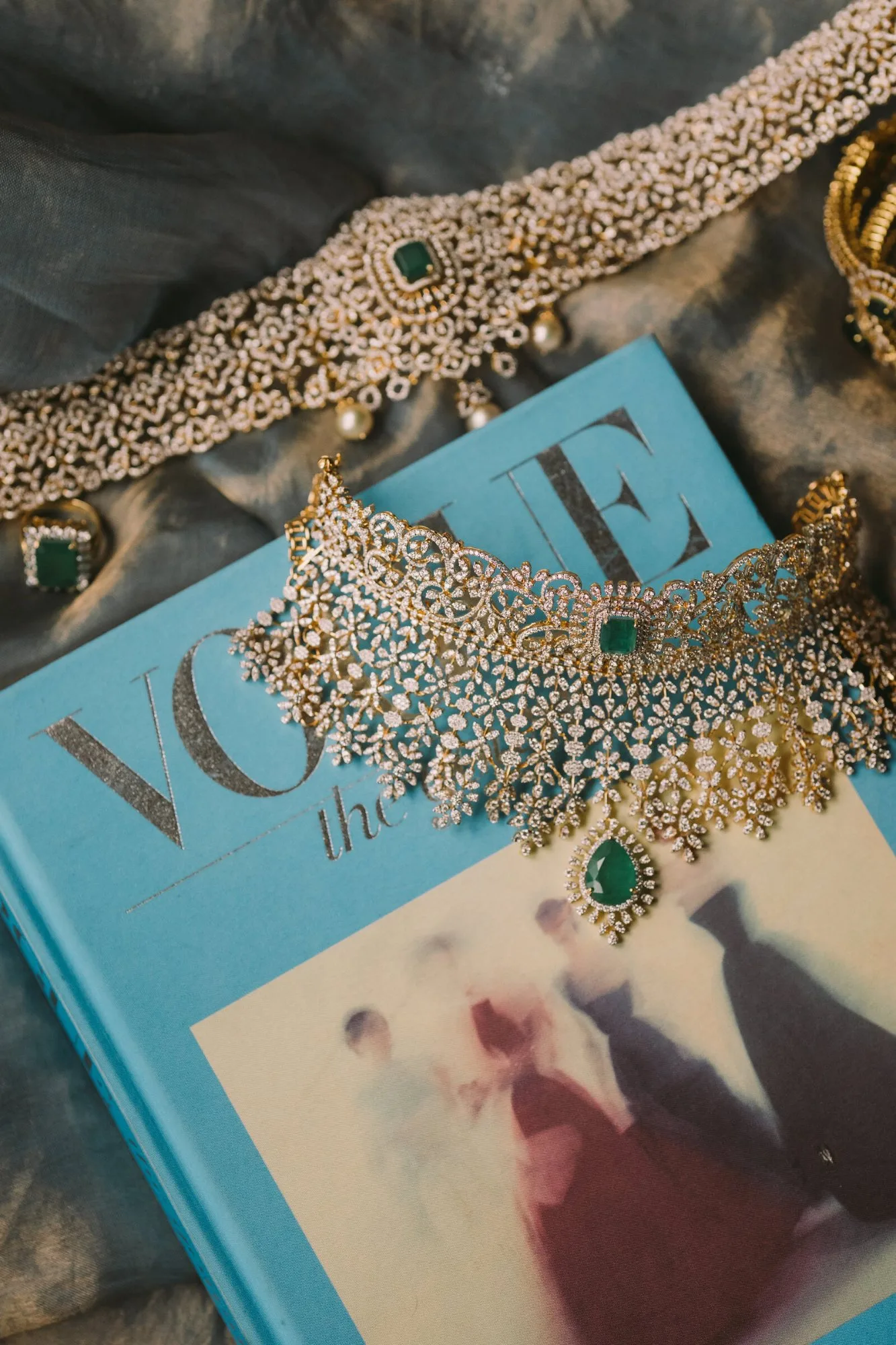A bride’s emerald and diamond jewellery set, laid out before the ceremony
