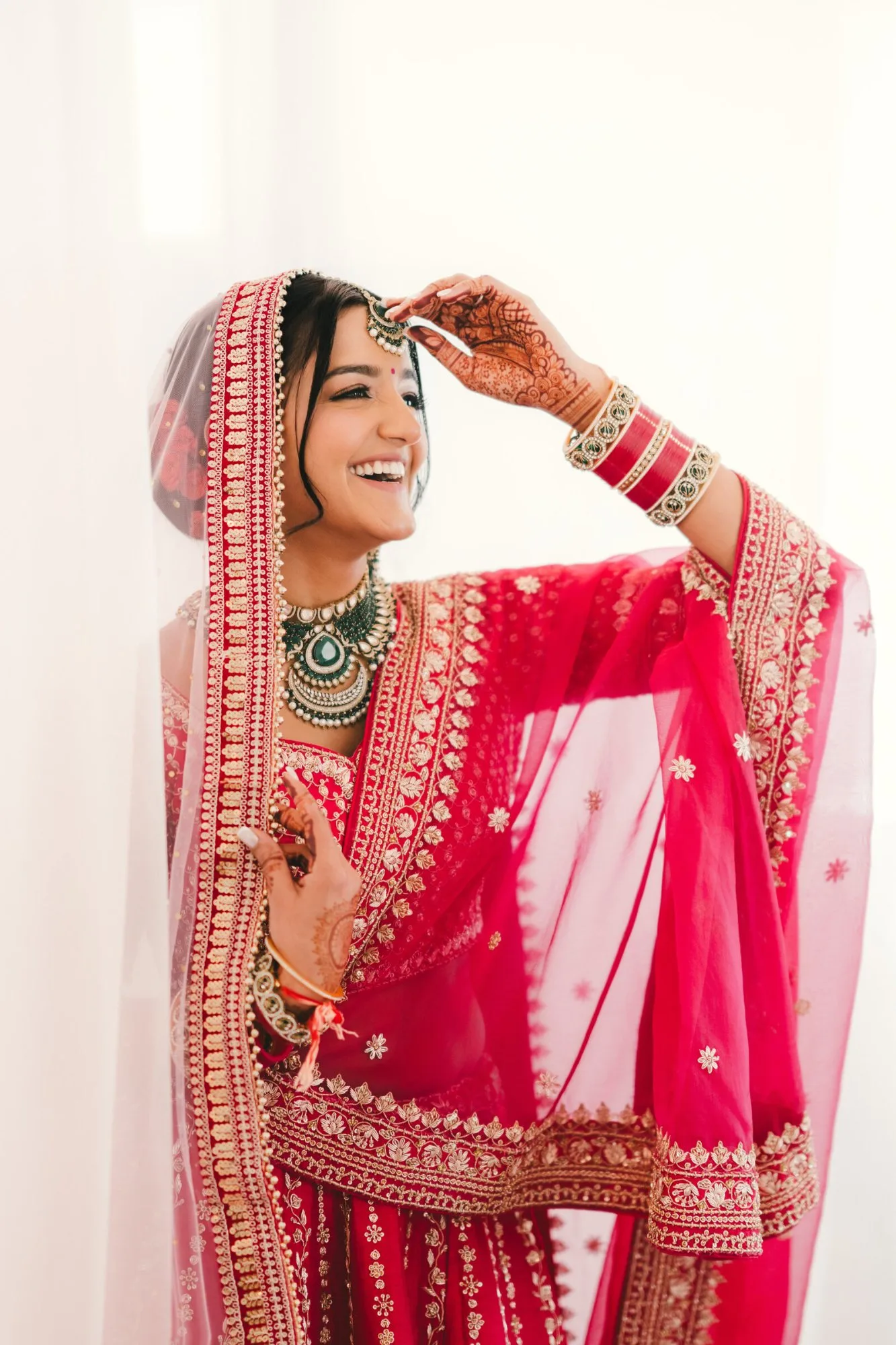 A couple photographed in a considered editorial portrait after their wedding ceremony